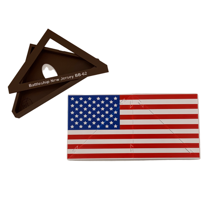 American flag decal and wooden plaque on a white background