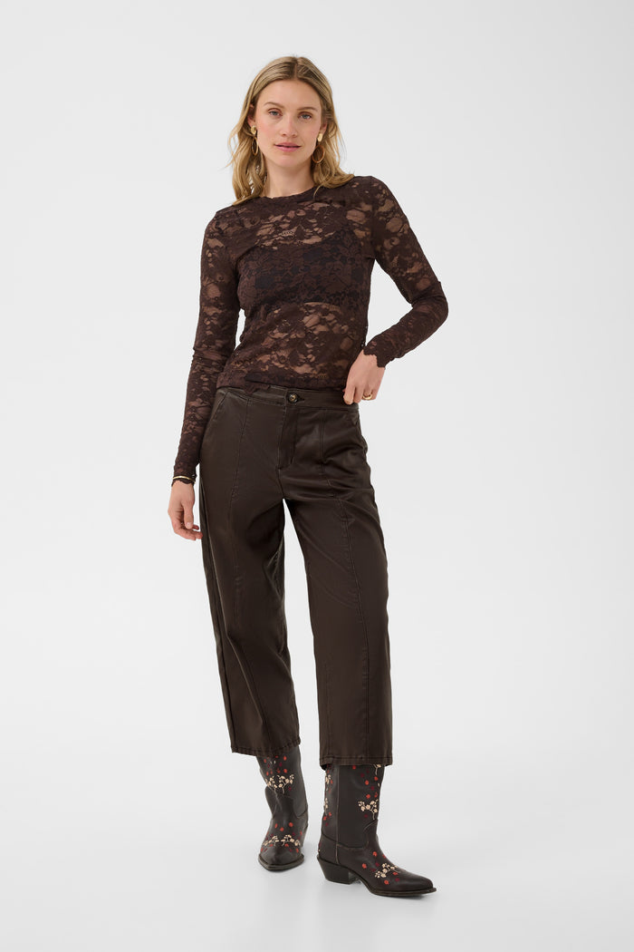 Cream 10615348 CRWinni Coated Ankle Trousers in Java Brown on model. Shop Cream at Dotique.