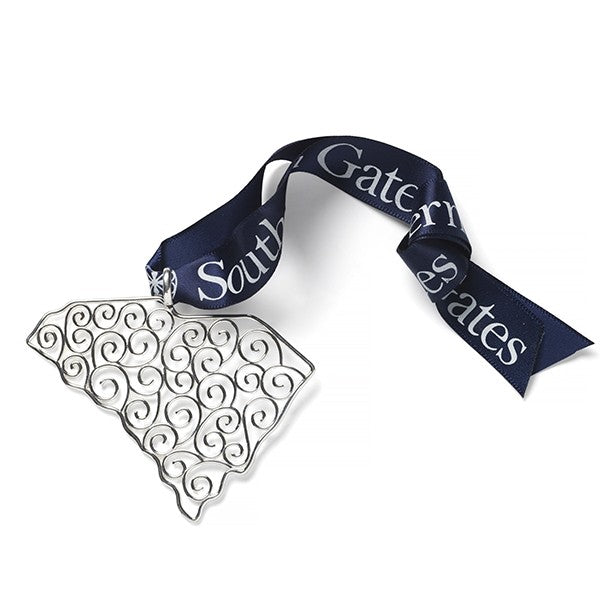 Southern Gates® 2023 Holiday South Carolina Ornament Holiday Series Filigree South Carolina Ornament A holiday collectable inspired by 18th and 19th century wrought iron gates throughout the South. Sterling silver plated Includes collectors box and signature Southern Gates® blue ribbon. Ornament size: 75x75mm