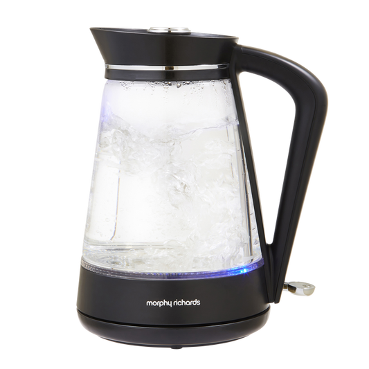 Glass electric kettle with black handle and base on a white background, featuring the Morphy Richards brand.