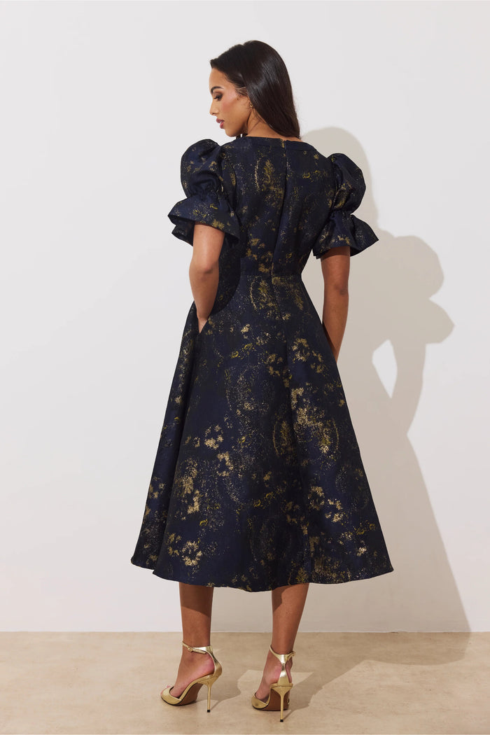 8th Sign Callie Button Dress Midnight Blue Gold back view on model. Shop 8th Sign at Dotique.