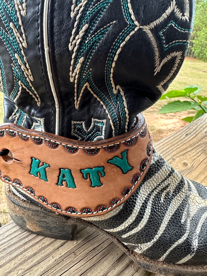 Hand tooled and painted spur straps