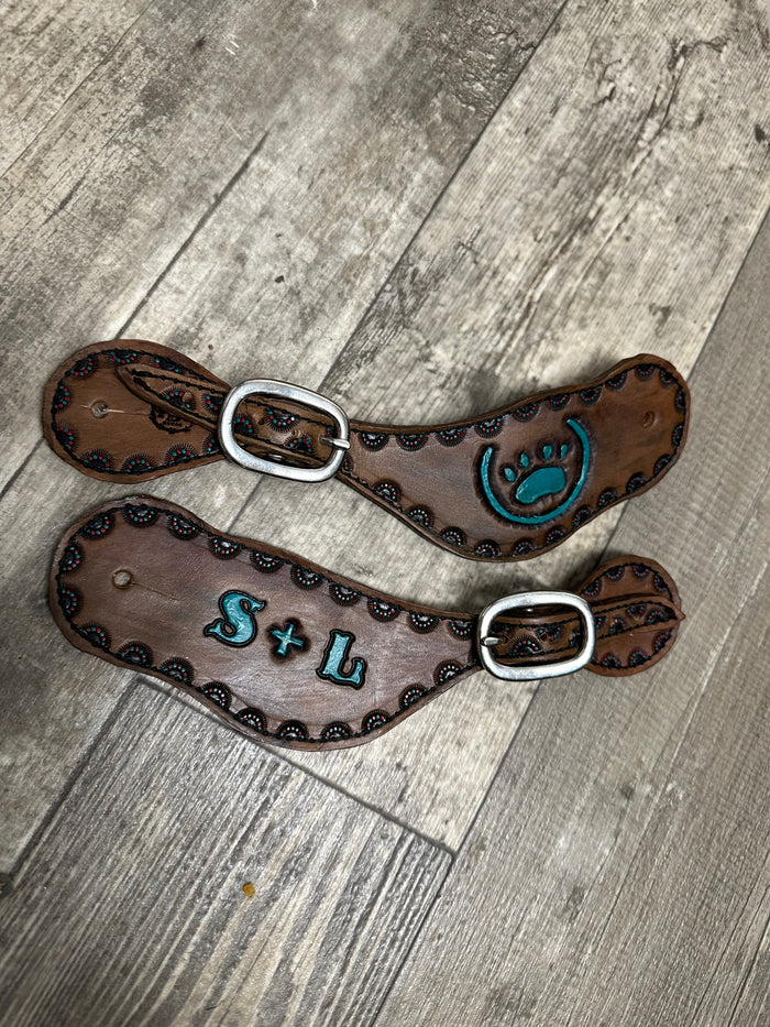 Custom Hand tooled and painted brand spur straps