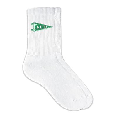 Alpha Sigma Tau collegiate pennant crew socks featuring AST Greek letters on white sporty crew socks