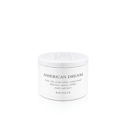 White candle tin container labeled 'American Dream' by Kringle on a white background