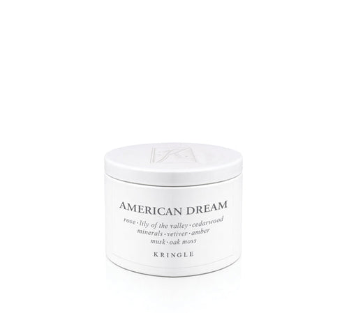 White candle tin container labeled 'American Dream' by Kringle on a white background