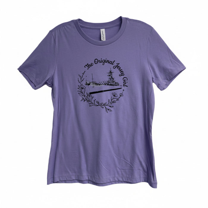 A purple crew neck t-shirt with a graphic print of the Battleship New Jersey and the text 'The Original Jersey Girl'.