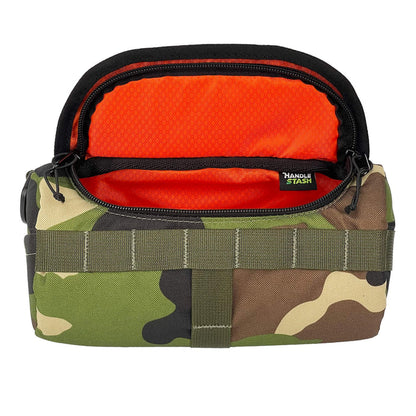 Camouflage HandleStash handlebar bag unzipped with blaze orange liner.