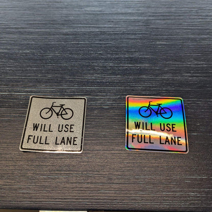reflective bike sticker (left) and holographic bike sticker (right) side by side