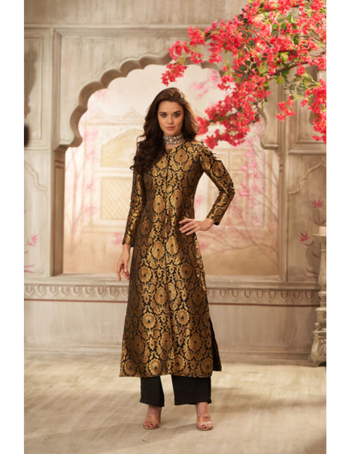 Black brocade jacket with straight pants for evening wear