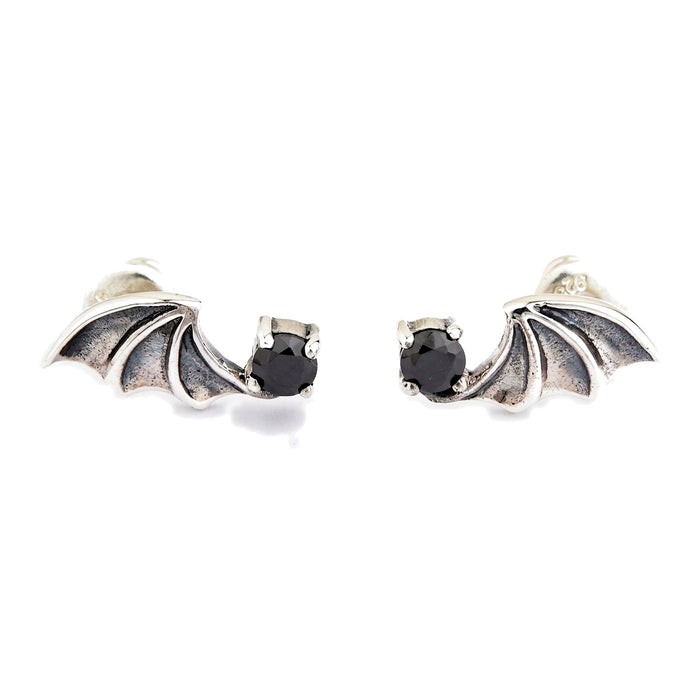 Black CZ bat wing stud earrings in .925 sterling silver, mirrored pair shown front-on with both stones facing inward