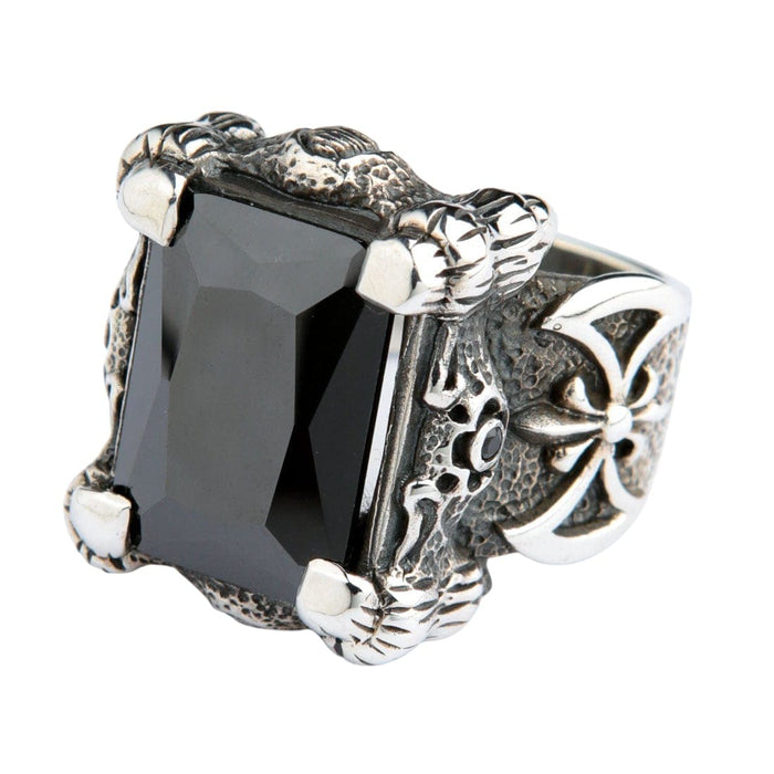 A side profile view of the dragon claw ring, highlighting the intricately engraved warrior's battle axe emblem on the band.