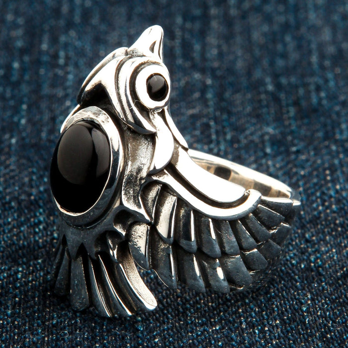 An angled view of the gothic mythical bird ring, showing its three-dimensional craftsmanship.
