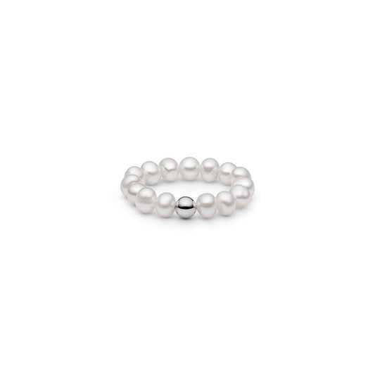 Ring med vita pärlor och en silverkula.