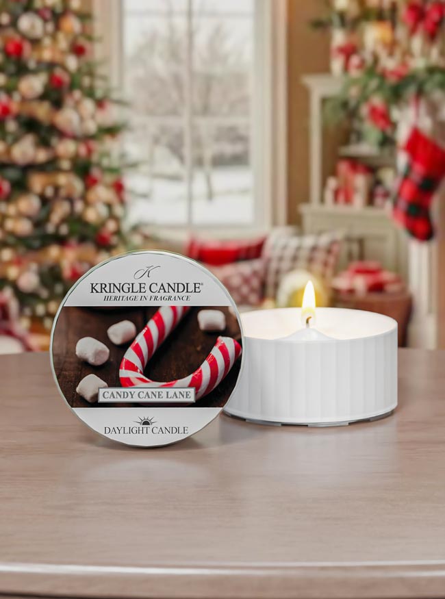 Kringle Candle daylight candle with packaging on a table in a festive setting