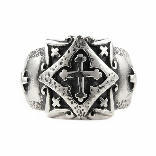 Front view of the handcrafted Celtic cross ring, highlighting the polished cross on the textured shield face.