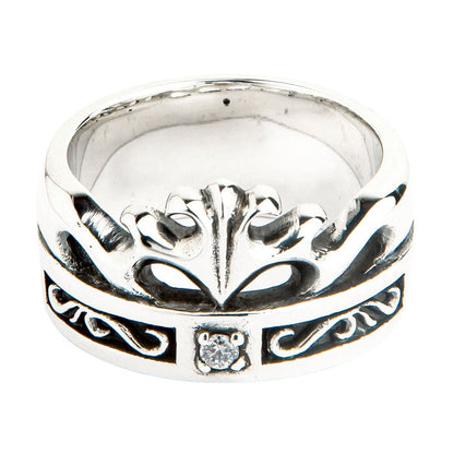 Front view of a wide silver Celtic crown band ring featuring knotwork cutouts and a center cubic zirconia stone.