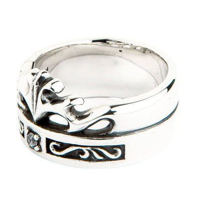 Angled profile of the 14mm silver band revealing a smooth polished interior and oxidized lower knotwork channel.