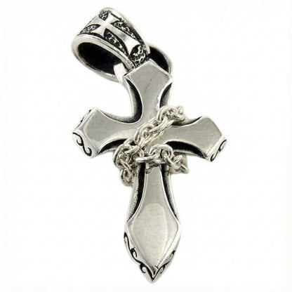 Front view showing the thickness of the silver cross pendant.