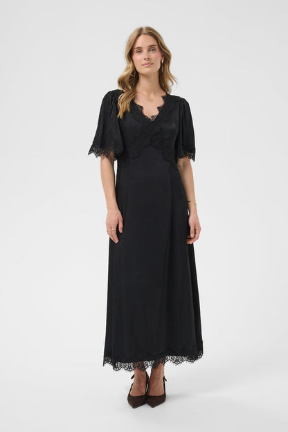 Cream 10615319 Confir Lace Maxi Dress Black on model with lace trim. Shop Cream at Dotique.