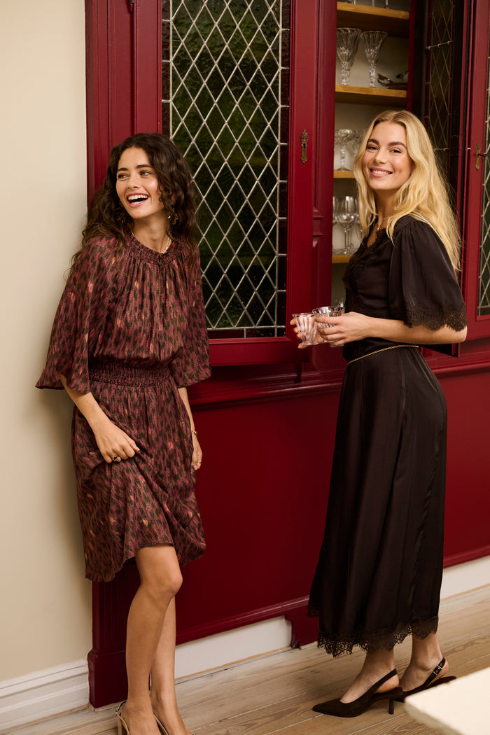 Cream 10615319 Confir Lace Maxi Dress in Java Brown on model. Shop Cream at Dotique.