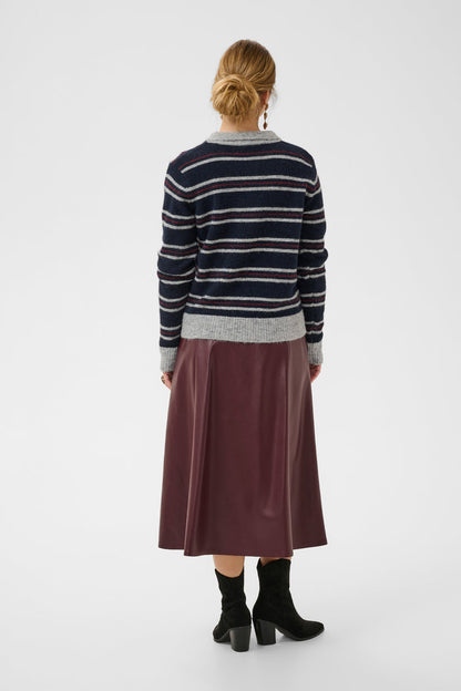 Cream 10615326 Ditte Striped Polo Pullover in Navy on model from behind. Shop Cream at Dotique.