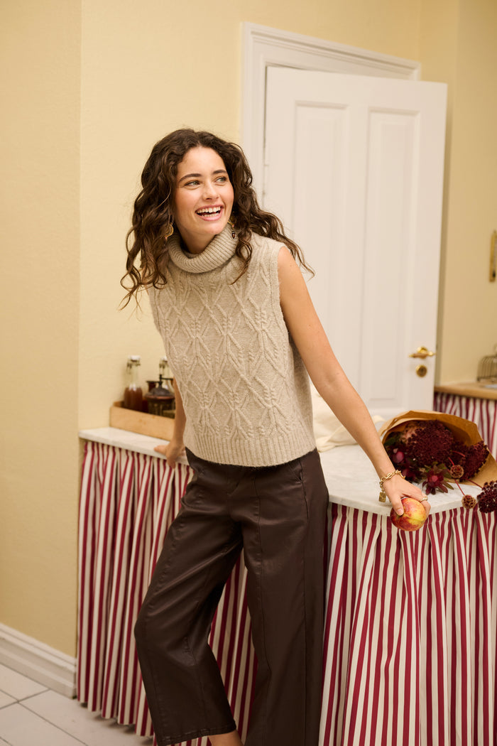 Cream 10615348 CRWinni Coated Ankle Trousers in Java Brown on model. Shop Cream at Dotique.