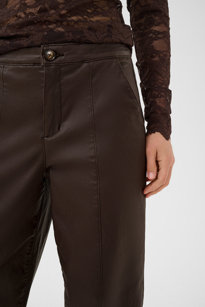 Cream 10615348 CRWinni Coated Ankle Trousers in Java Brown close up. Shop Cream at Dotique.