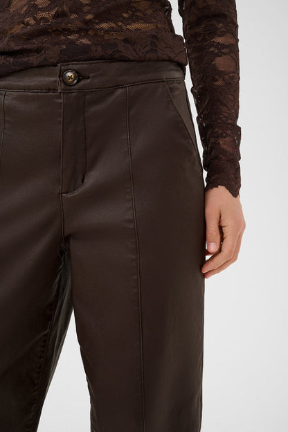 Cream 10615348 CRWinni Coated Ankle Trousers in Java Brown close up. Shop Cream at Dotique.