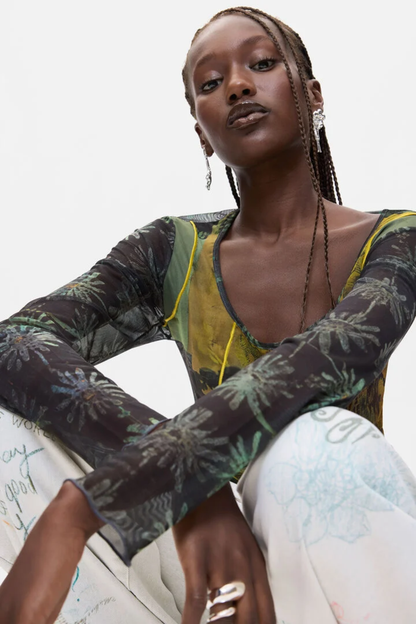 Model wearing Desigual Printed Long Sleeve Top – Black Multicolour. Shop Desigual at Dotique.