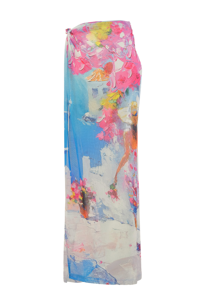 Abstract print sarong skirt by Dolcezza with a soft stretch fabric. Lightweight, flattering and perfect for holidays and poolside styling. Shop at Dotique.