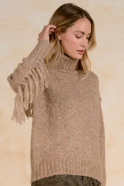 Elan SWF11734 Turtleneck Fringe Sweater Natural Melange on model Shop Elan at Dotique