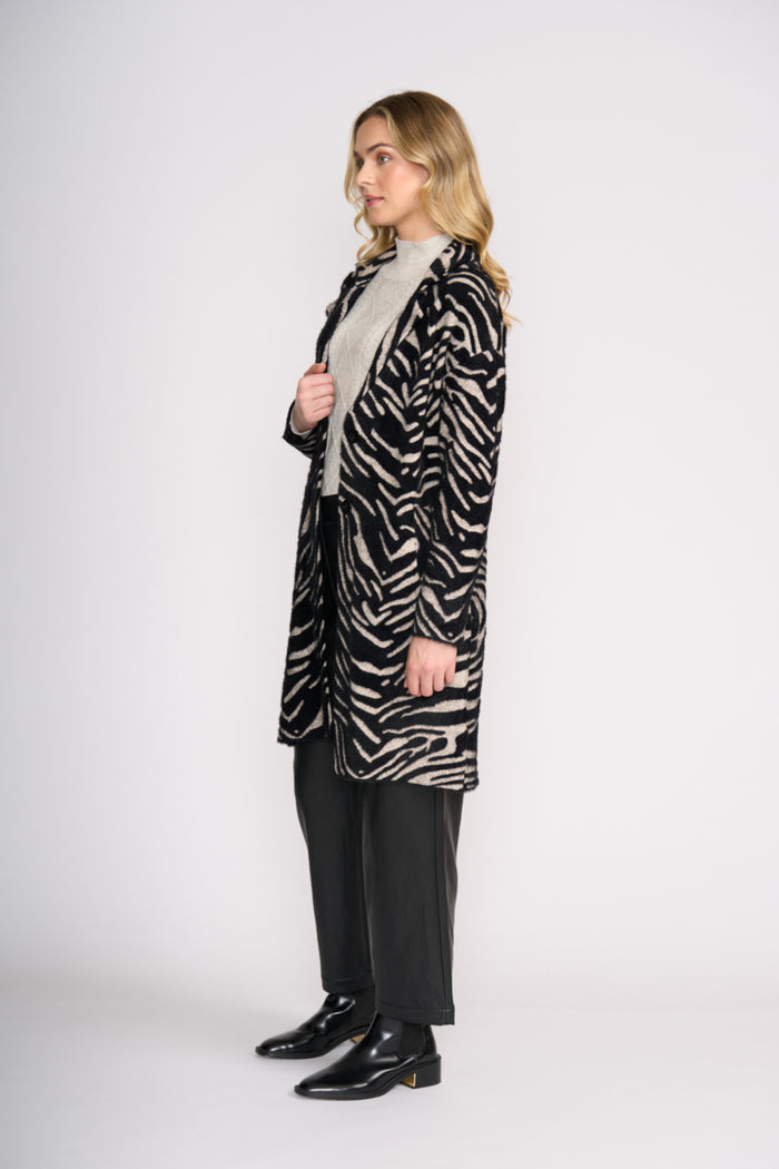 Foil FO8370 Lash Queen Coat Zebra side view on model Shop Foil at Dotique