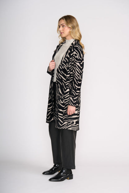 Foil FO8370 Lash Queen Coat Zebra side view on model Shop Foil at Dotique