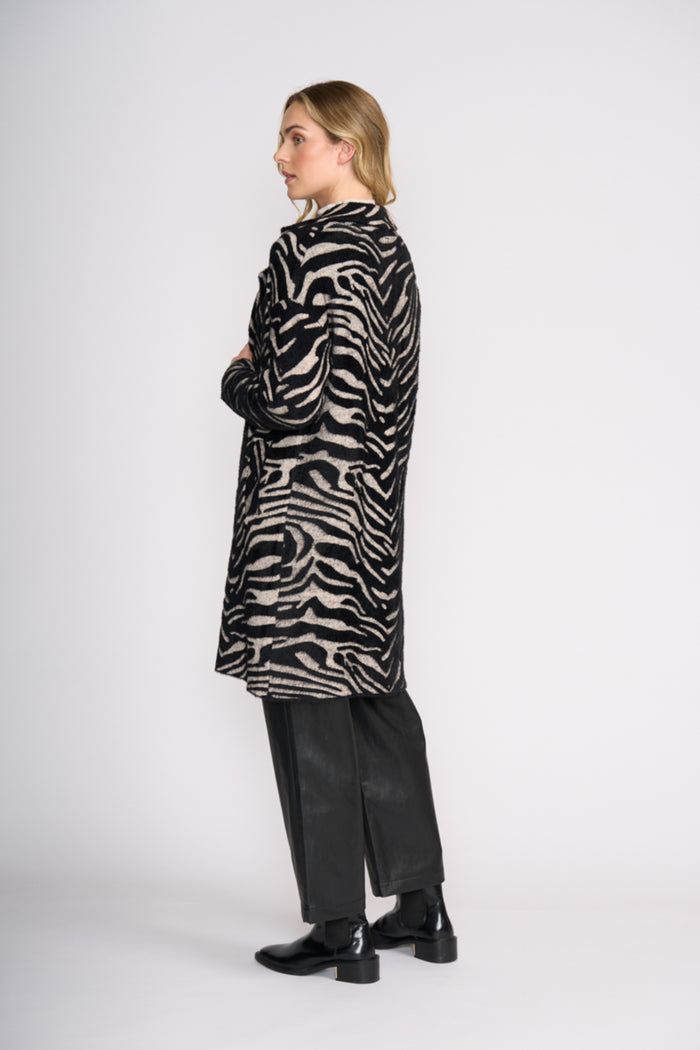 Foil FO8370 Lash Queen Coat Zebra side view on model Shop Foil at Dotique