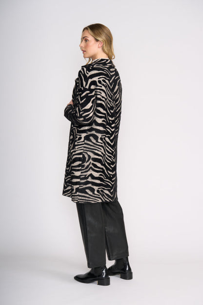 Foil FO8370 Lash Queen Coat Zebra side view on model Shop Foil at Dotique