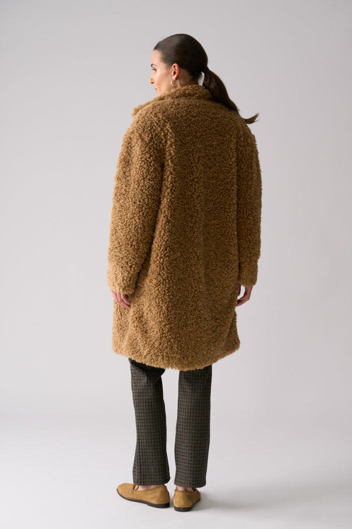 Back view of Foil FO8385 Yogi Coat Nougat on model. Shop Foil at Dotique