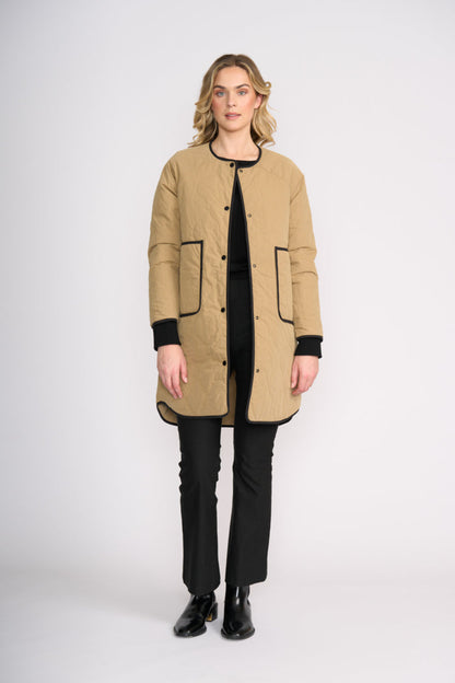 Foil FO8388 Hidden Talent Reversible Coat Black & Tan on model. Shop Foil at Dotique