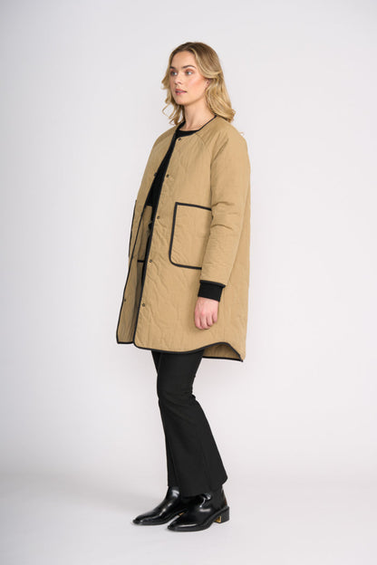 Model wearing Foil FO8388 Hidden Talent Reversible Coat Black & Tan. Shop Foil at Dotique