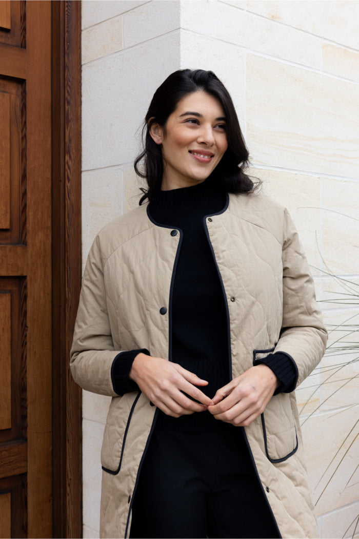 Foil FO8388 Hidden Talent Reversible Coat Black & Tan on model. Shop Foil at Dotique
