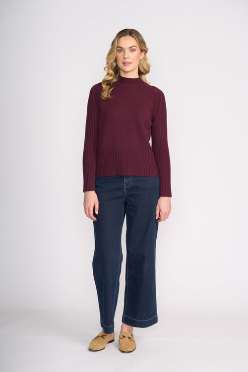 Model wearing Foil FO8457 Tread Carefully Jumper Black Cherry. Shop Foil at Dotique