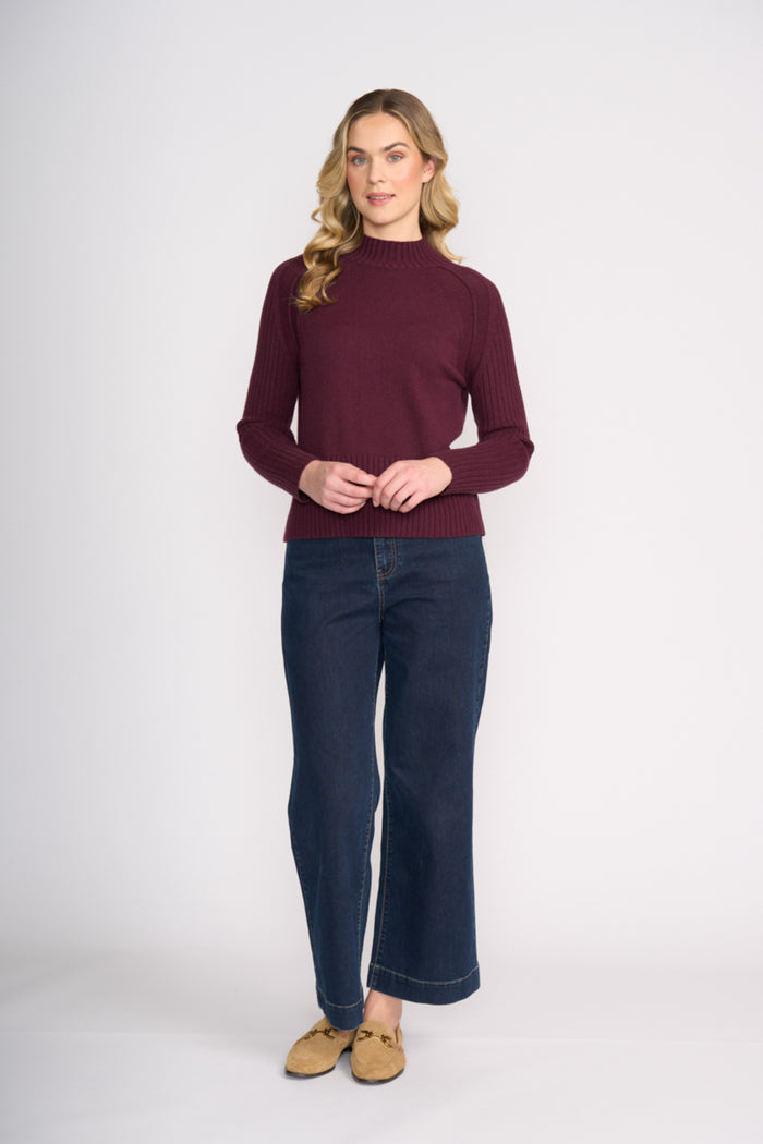 Model wearing Foil FO8457 Tread Carefully Jumper Black Cherry. Shop Foil at Dotique