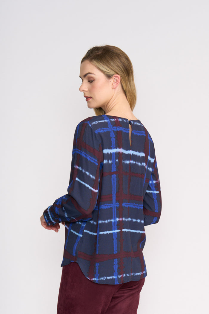 Side view of model wearing Foil FO8500 Well Aligned Blouse Mod Geo Size. Shop Foil at Dotique