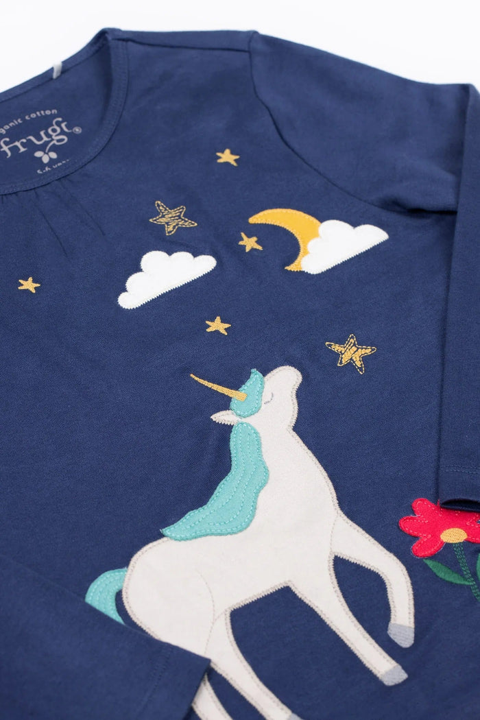 Navy blue shirt with unicorn, stars, and clouds design on a white background