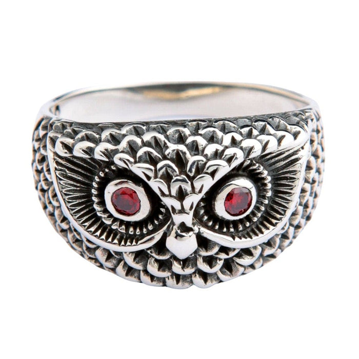 Sterling silver owl ring with red garnet eyes and detailed feather texture front view