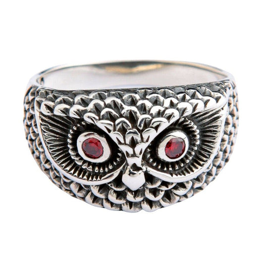 Sterling silver owl ring with red garnet eyes and detailed feather texture front view