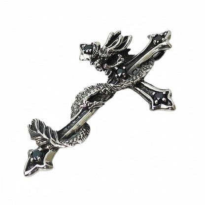 An angled view of the dragon cross pendant, highlighting the black CZ stones.