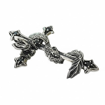 A detailed close-up of the dragon's scales and flames as it coils around the cross.