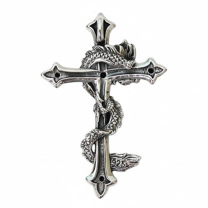 The back of the polished dragon cross pendant, showing the .925 hallmark stamp.