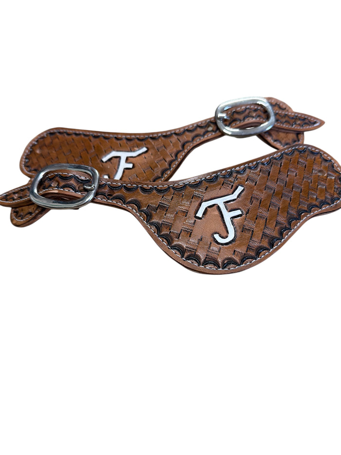 Hand tooled and painted Custom Brand spur straps basketweave.